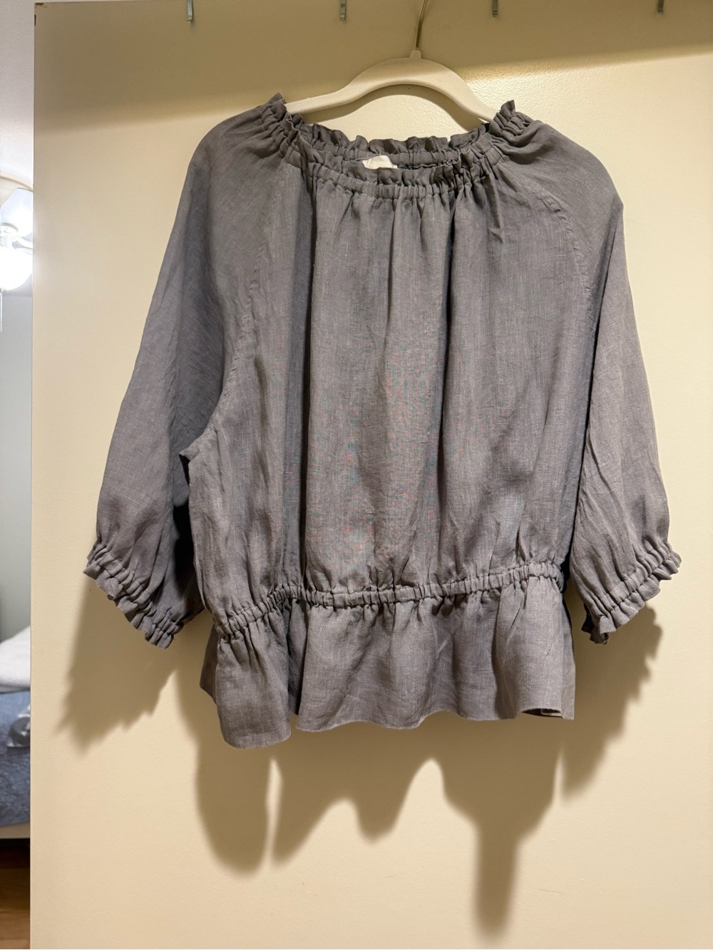 Smocked-Neck Flutter Hem Blouse in Gray